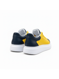 Luna Solar yellow and navy colorblock casual sneaker by Apollo Moda, fourth angle